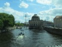 Tour boats go by the museums