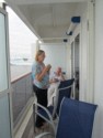 June and Pete relax on the balcony