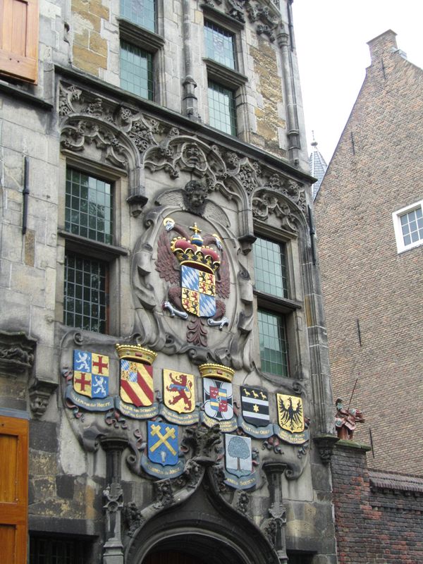 Coats of arms from families that lived in this building