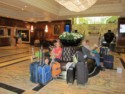 June waits in the hotel lobby for Pete to get the rental car