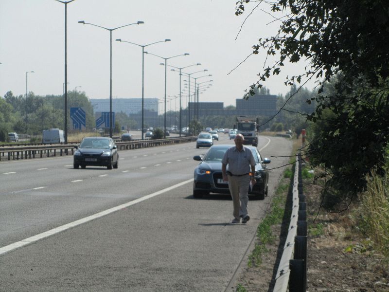 The rental car blows a tire on the freeway