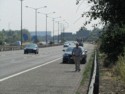 The rental car blows a tire on the freeway