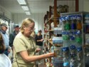 June shops for souvenirs at a store at the pier