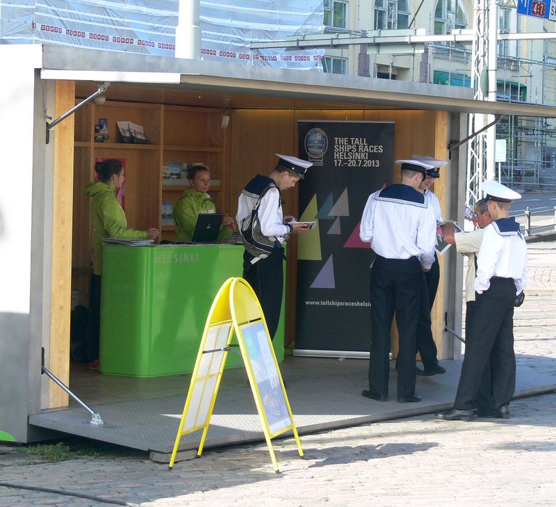 Sailors at the Tall Ships Races booth