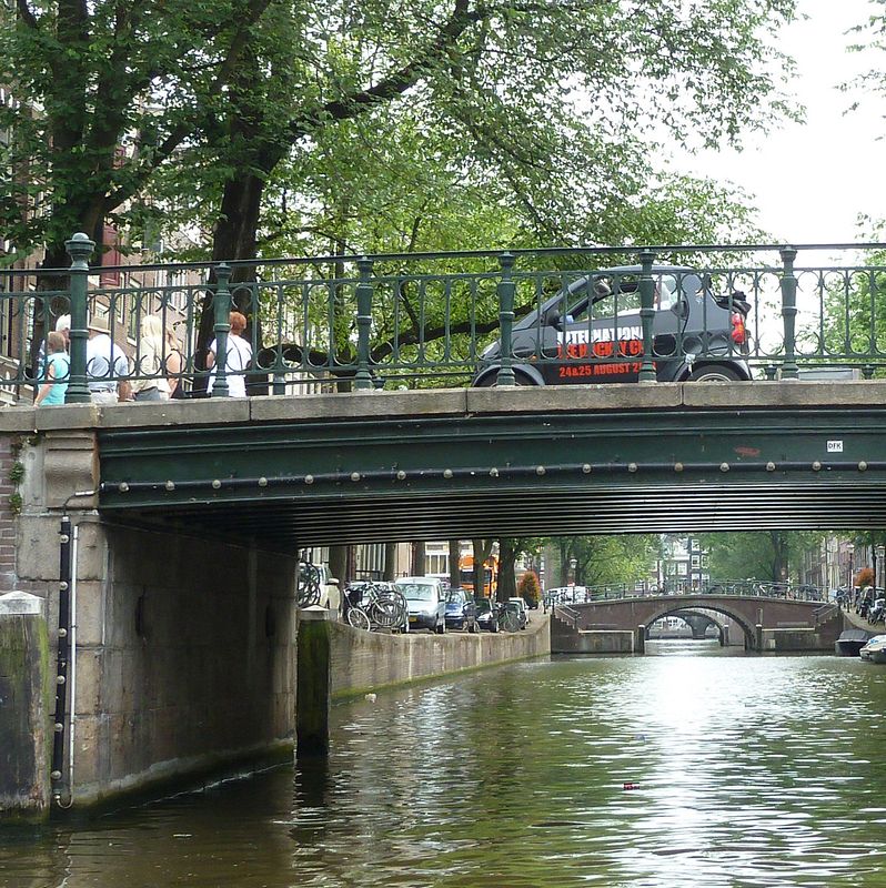 Smart crossing a canal in Amsterdam