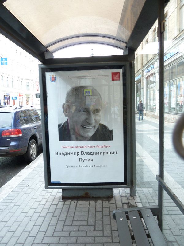 Putin on a bus stop poster