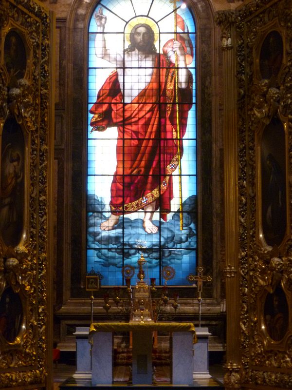 Stained glass Christ above the altar