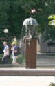 Fountain with naked kids and an umbrella