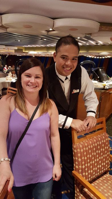 Jessica with a dining room steward