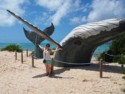 Jessica next to a statue of a whale