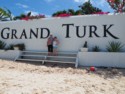 June and Jessica at the Grand Turk sign