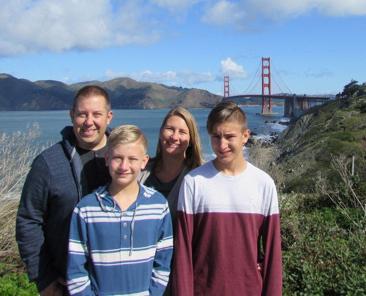 The family with the Golden Gate Bridge in the background