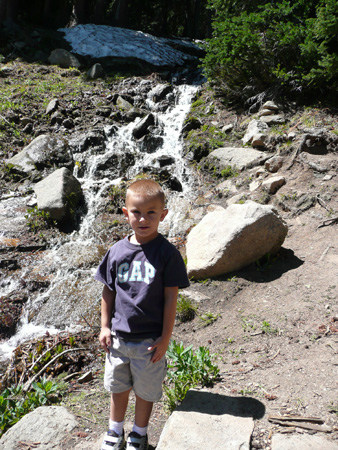 037 Andrew in Rocky Mtn National Park at one of the many waterfalls