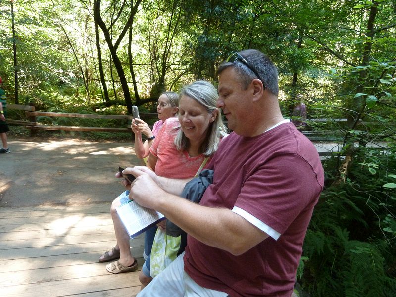 June takes a picture while Diane and Brian review their's