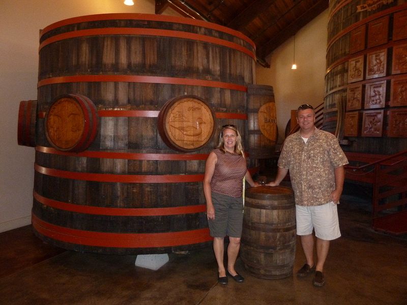 Diane and Brian in front of a carved tank