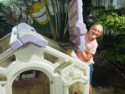 Cora fixes the roof of a play house