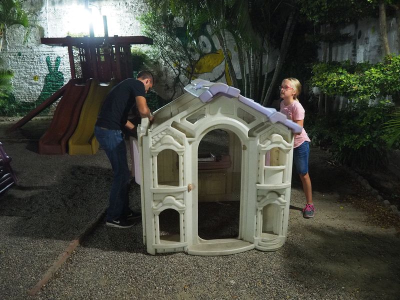 Matt and Cora repairing the play house