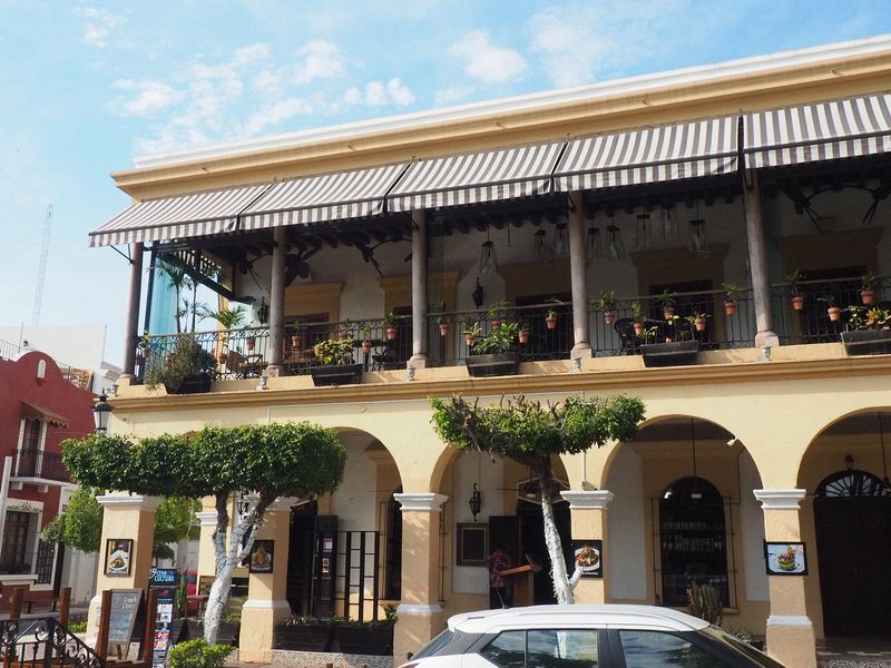 A two-story building next to the Plazuela Machado