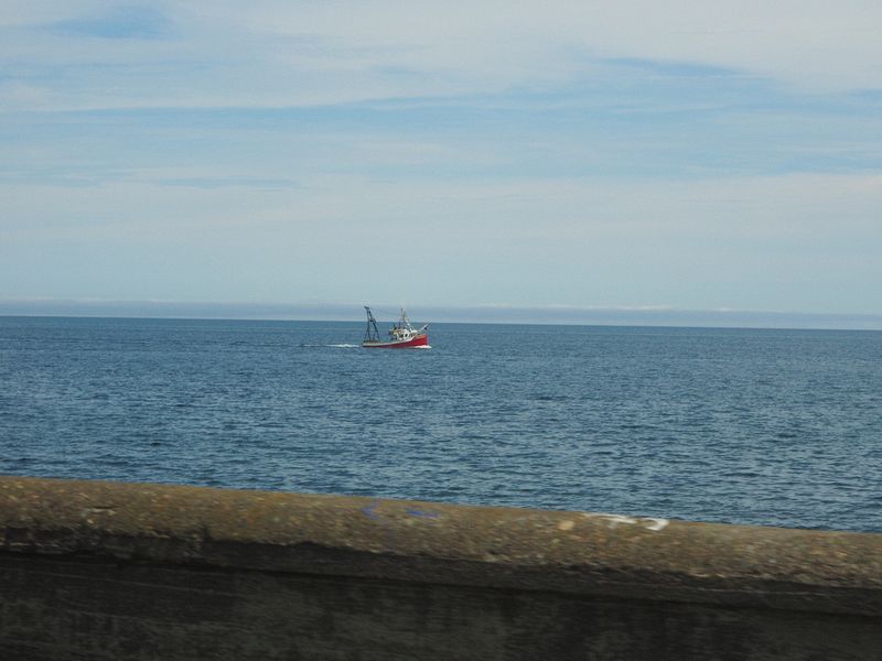 Fishing boat going out