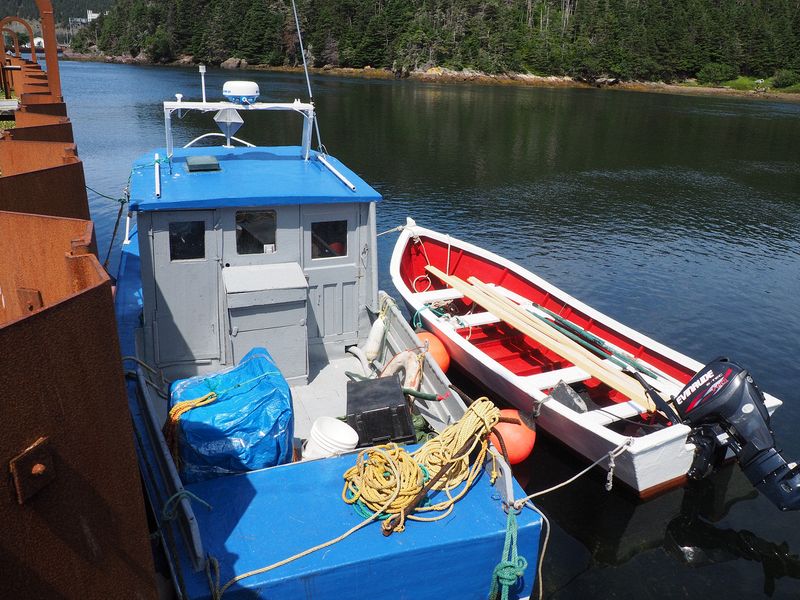 Fishing boat docked to the sea wall