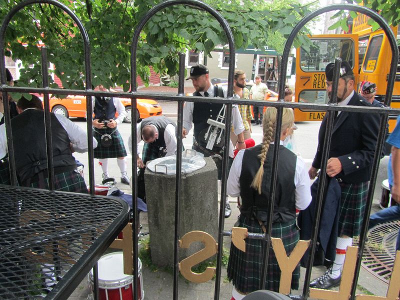 Bagpipers get ready to play