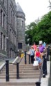 Eloise, Linda, Livingston, and June on steps between Water and Duckworth Streets