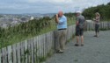 Pete, Livingston, and Eloise take pictures from an overlook