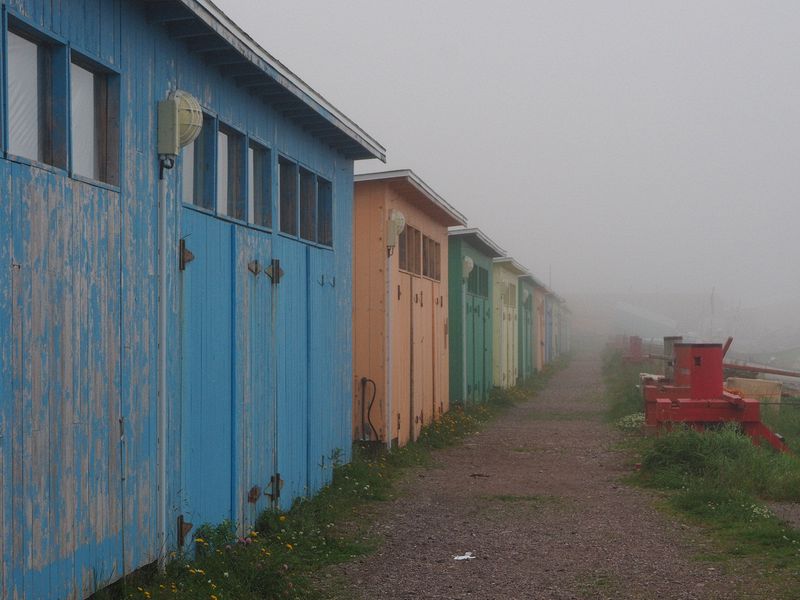 Colorful boat sheds could use a coat of paint