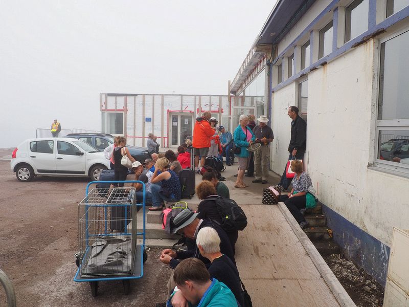 We wait in line for the ferry to return to Newfoundland