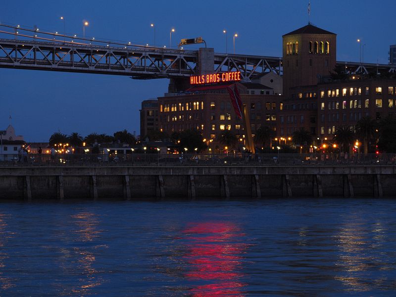 Building lights reflect on the water