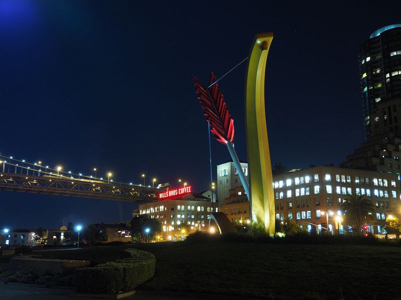 Cupid's Span sculpture with Hills Bros Coffee in the background