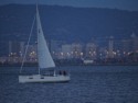 Gratitude sailboat with downtown Oakland in the background