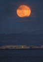 Moon rising aboe the Oakland Hills