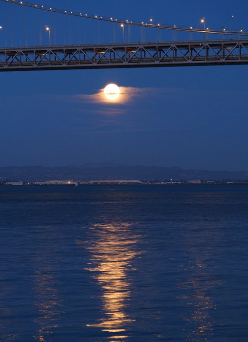 The moon reflects on the water