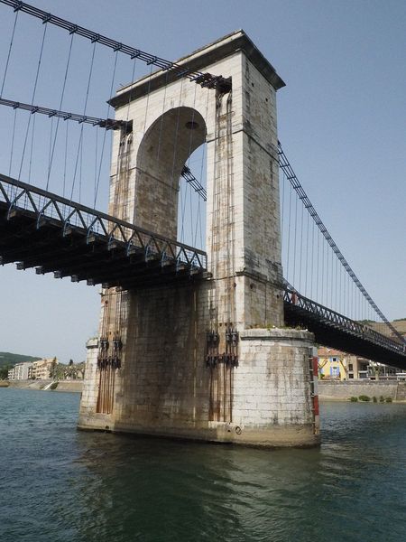 Our riverboat passes underneat the bridge as we leave