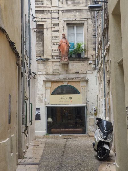 Statue of Mary at end of a street