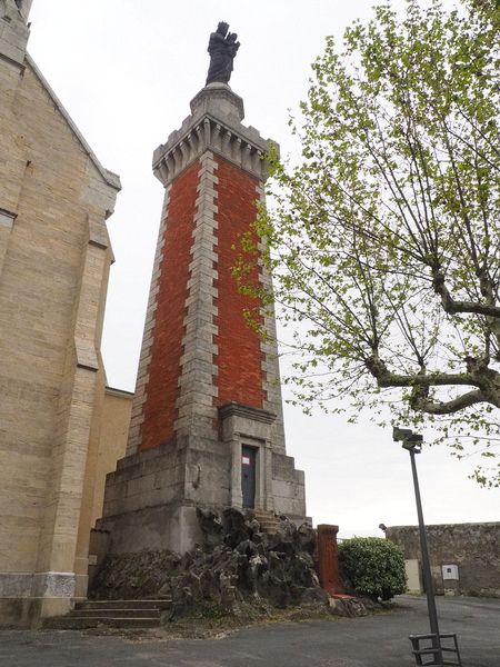 Statue of Mary on a tower next to the Chapelle Notre-Dame de Pipet