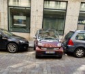 This Smart Car squeezes into this tiny spot